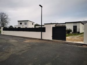 Portail coulissant Aluminium motorisé et clôture SIB ral 2100 noir